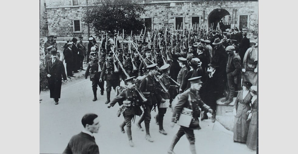 Crowds gathered to watch the men depart through the main gate at the Royal Barracks