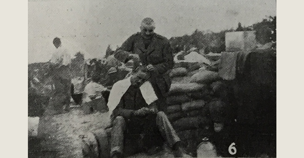 Soldier getting his hair cut